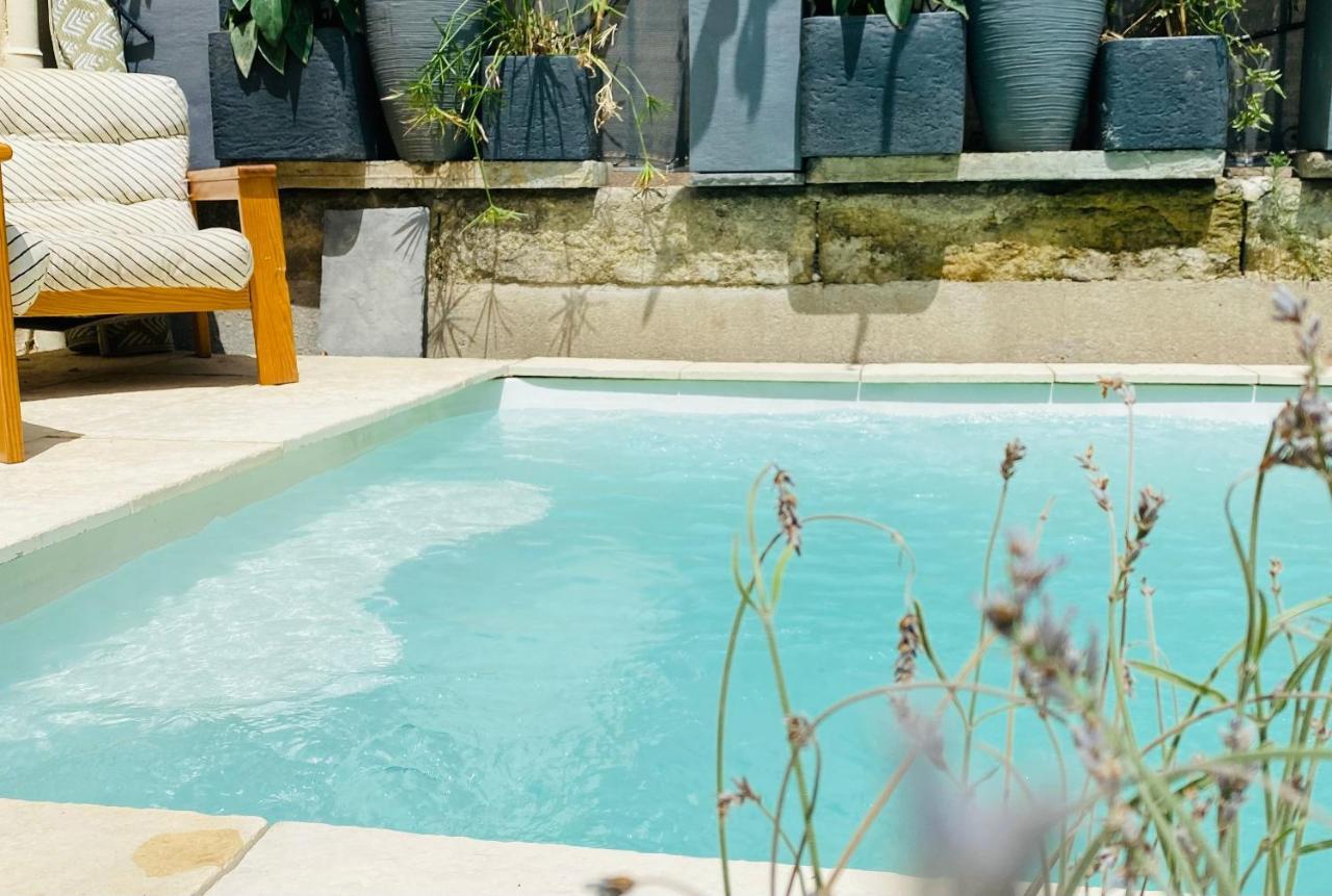Le Jardin Hotel Aspiran Bagian luar foto