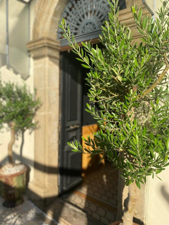 Le Jardin Hotel Aspiran Bagian luar foto