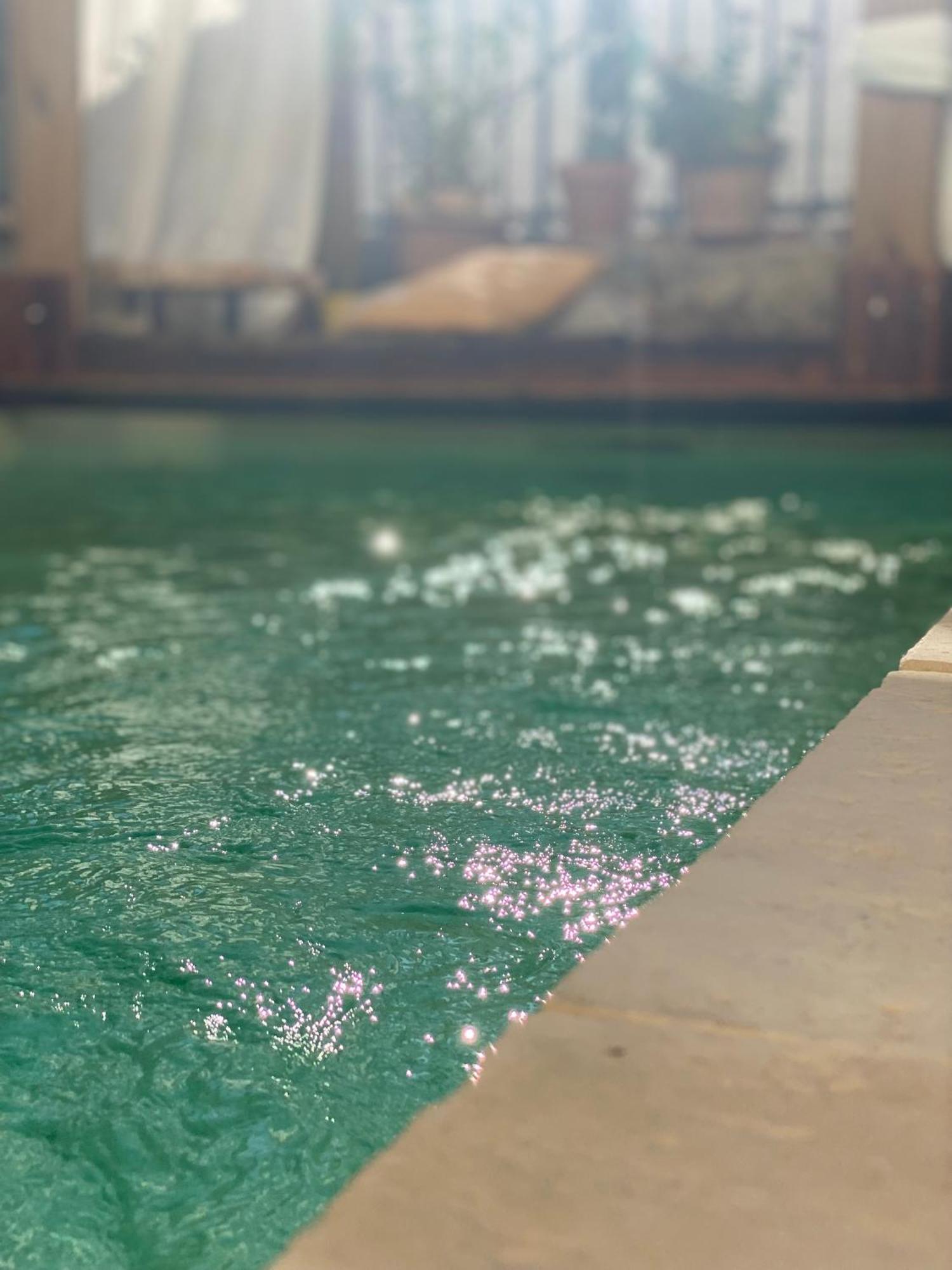 Le Jardin Hotel Aspiran Bagian luar foto